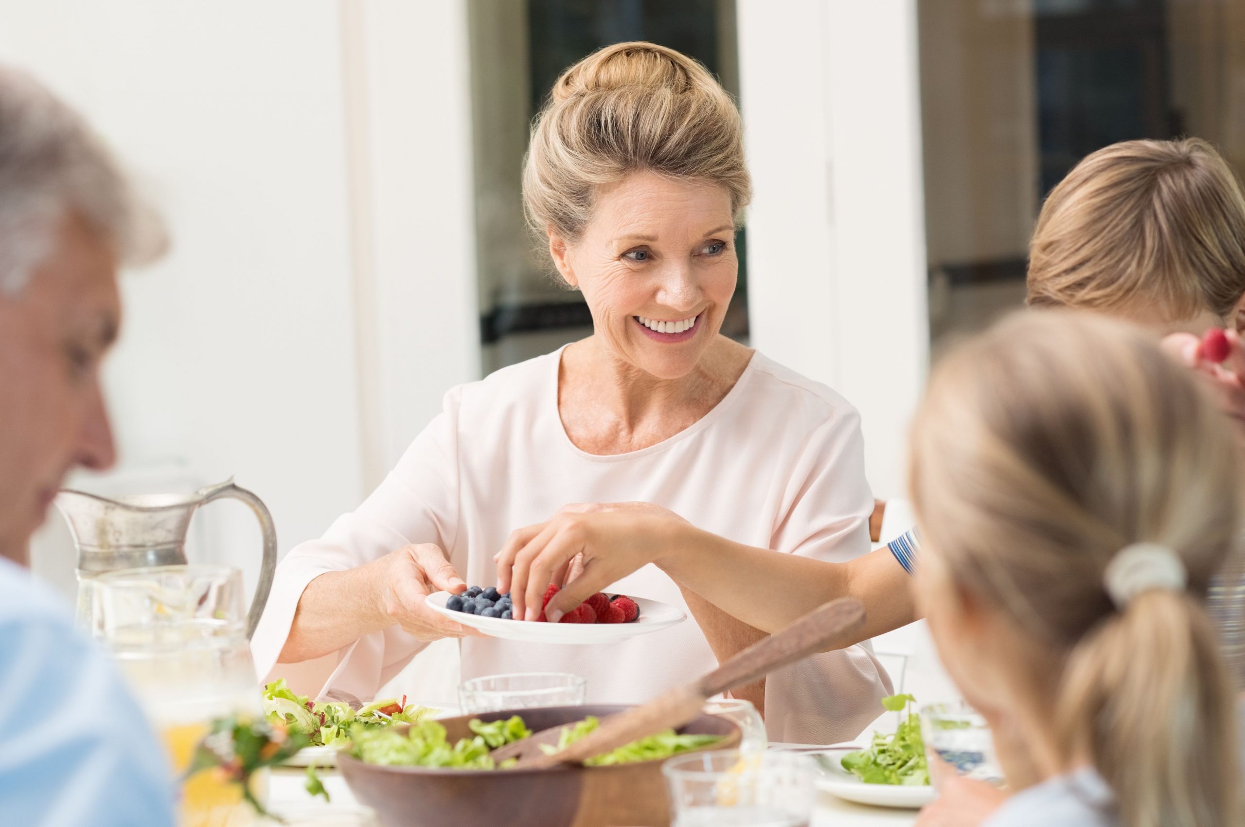 Woman dining with family