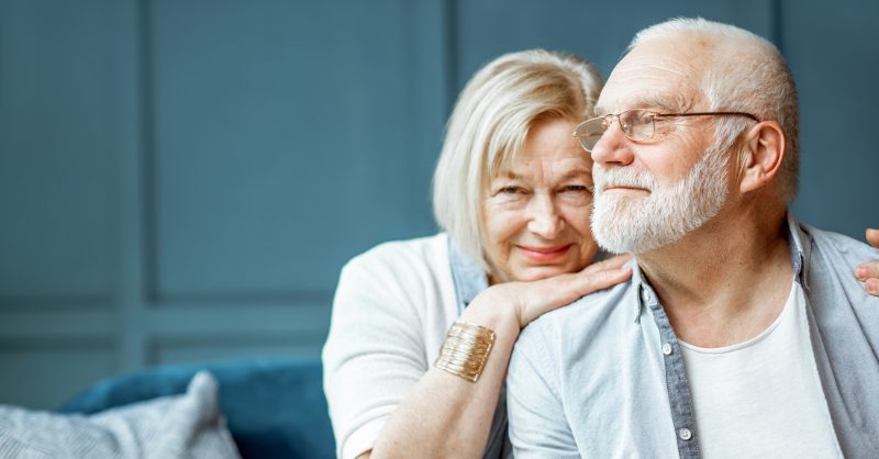 Woman leaning on man's shoulder