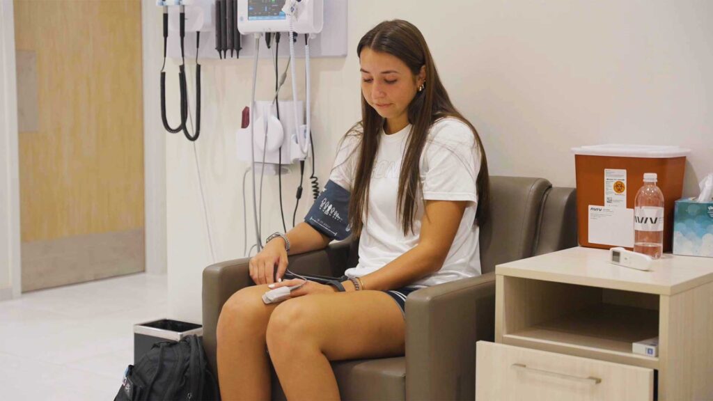 Caroline Ducharme at Aviv Clinics vitals station
