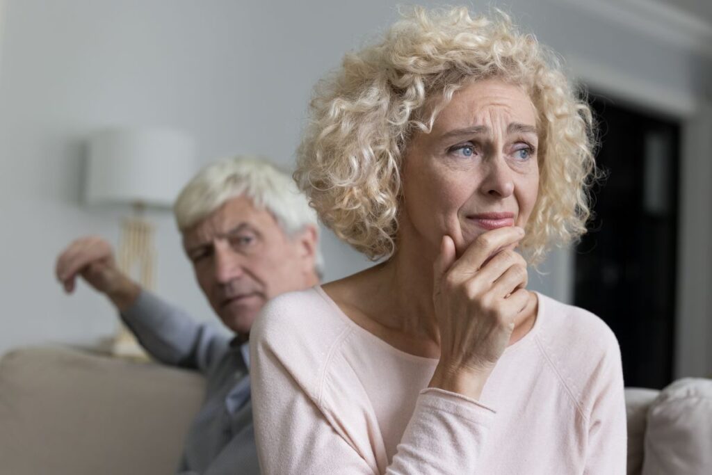 Woman experiencing emotional abuse, a suspected cause of fibromyalgia