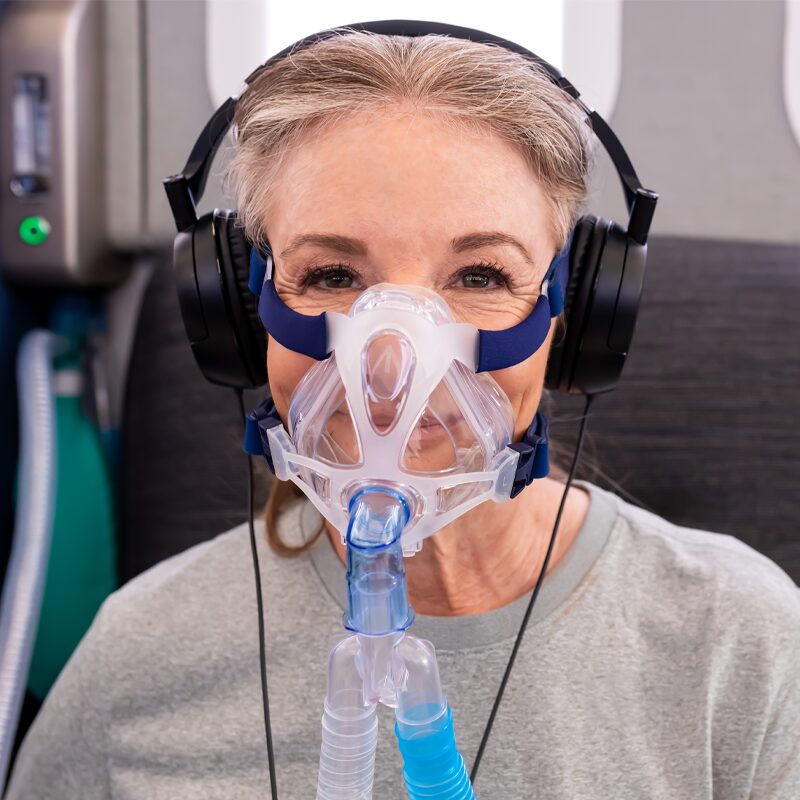 Woman in UHMS-Accredited HBOT Chamber at Aviv Clinics